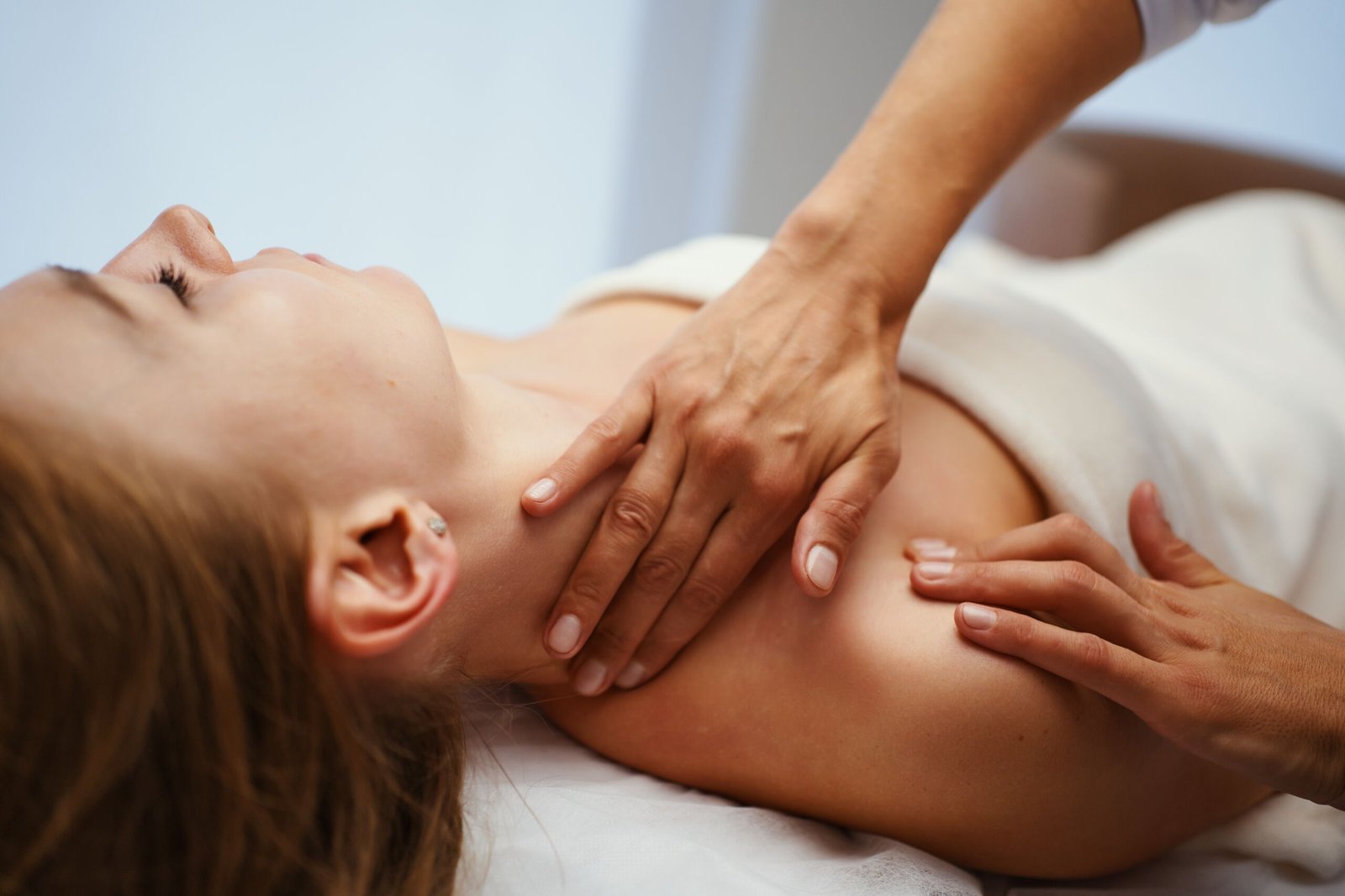 Shoulder massage in a relaxing environment at HealthCure Massage